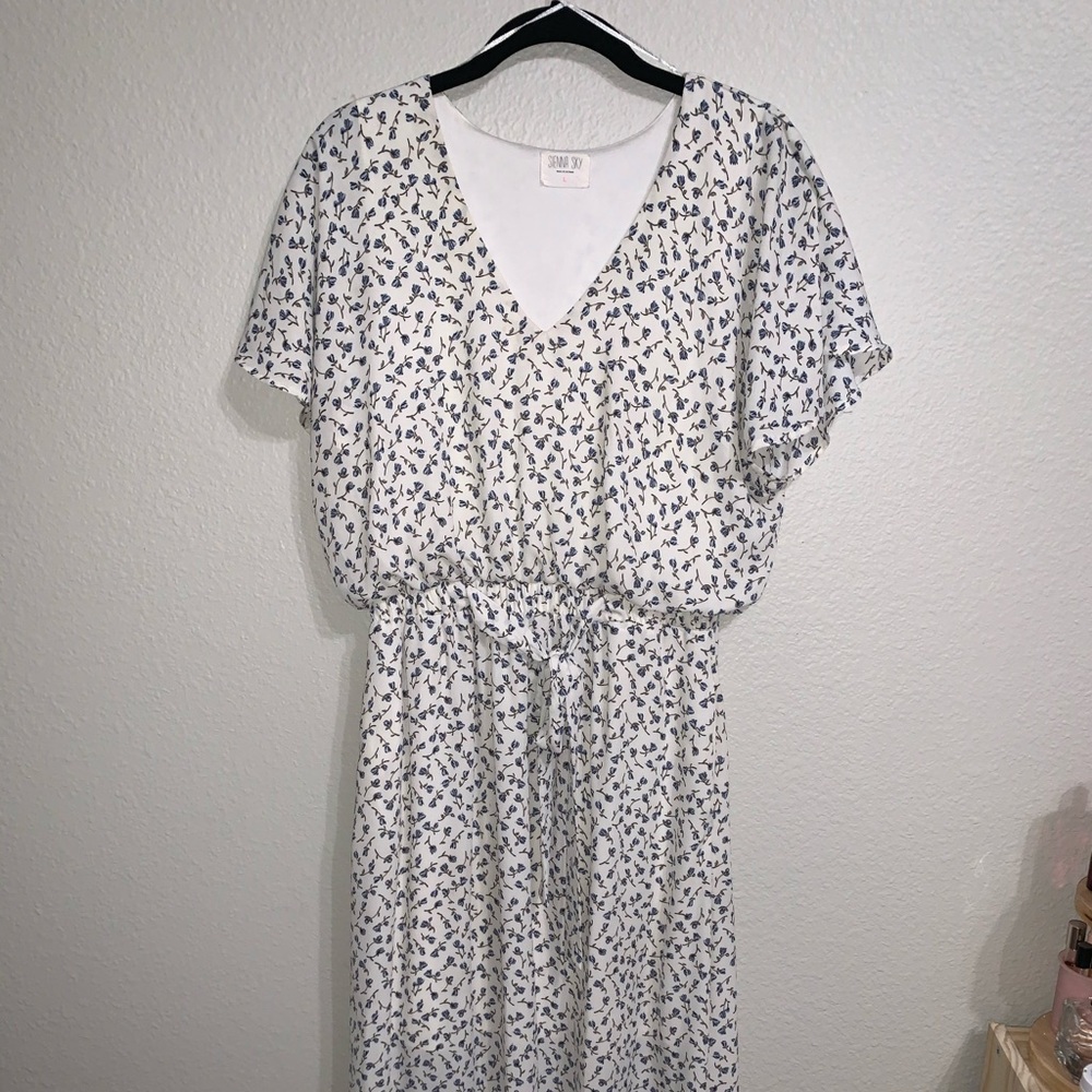 White dress with blue flowers